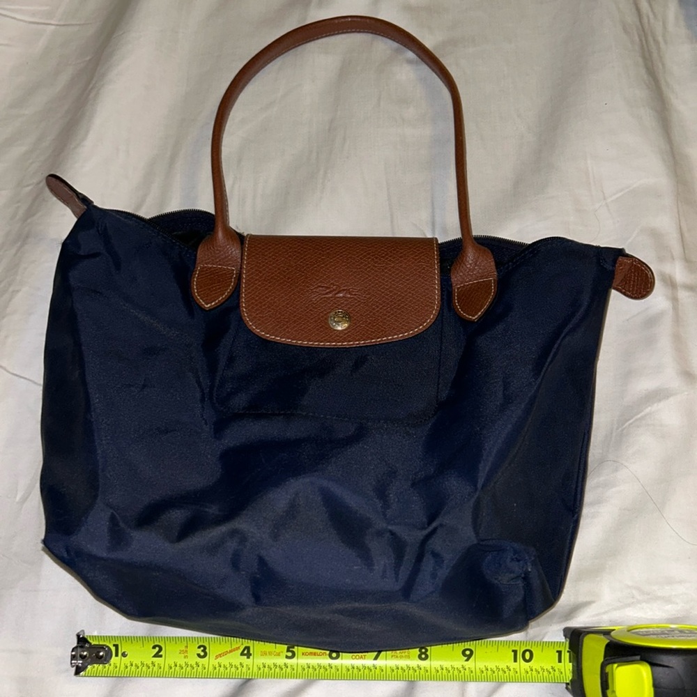 Lightly used Longchamp navy blue tote.
